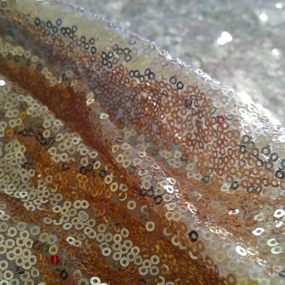 I am selling this gold sequence table cloth